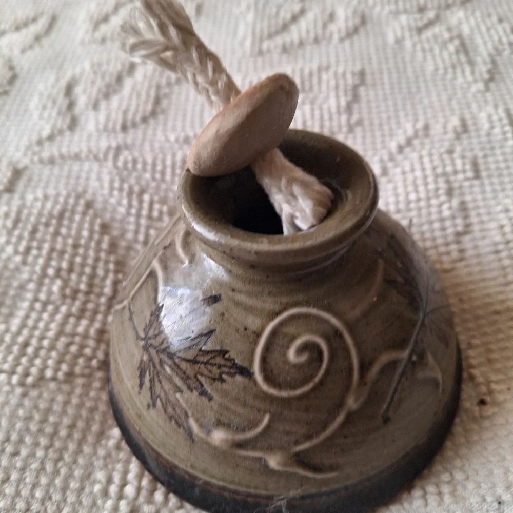 Handmade pottery lamp with wick